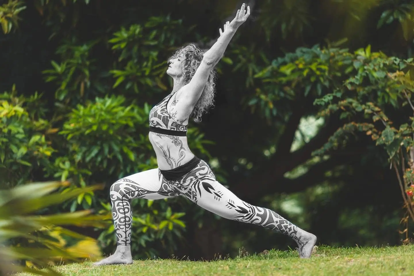 Titaua practicing yoga outdoors